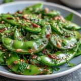 Crisp, refreshing Snap Pea and Radish Spring Salad tossed with bright herbs and dressing.