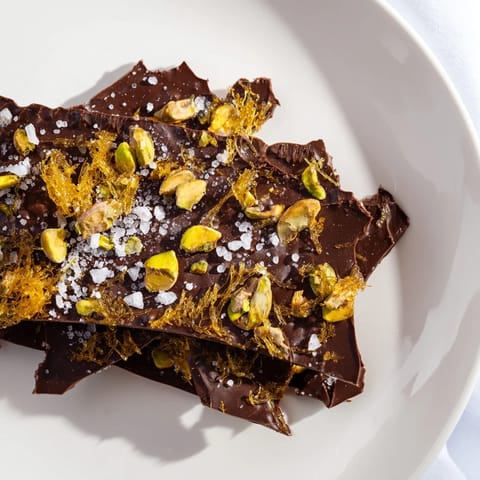 Dark chocolate Kataifi Bark with crunchy kataifi and pistachios: a delicious dessert fusion.