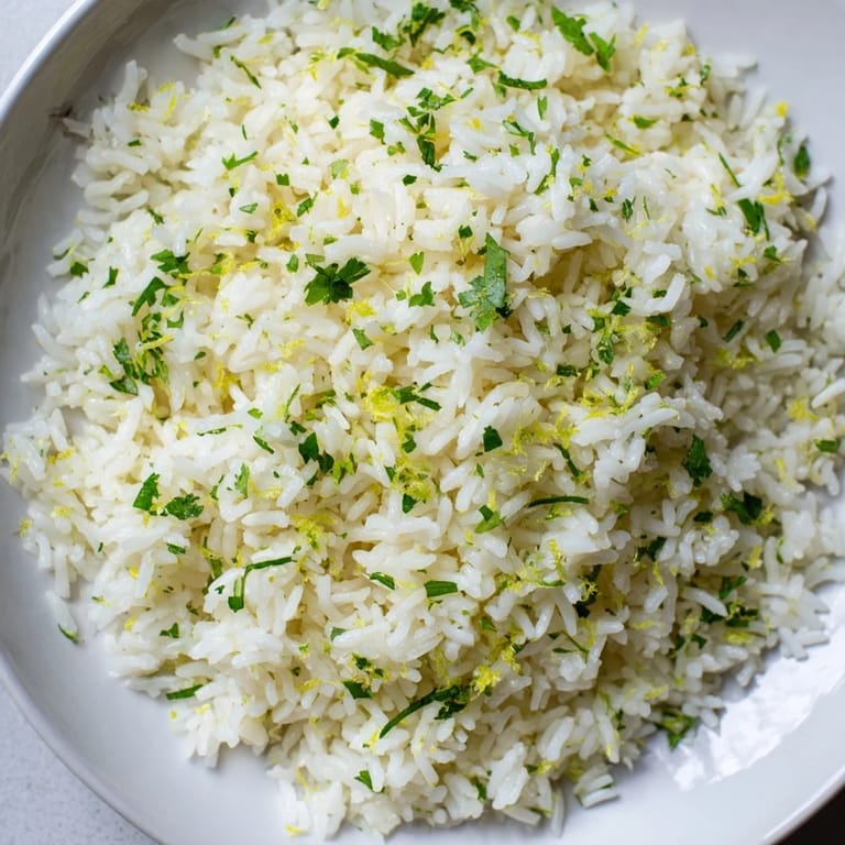 A delicious bowl of warm cilantro lime rice, perfect to serve with grilled chicken or fish.