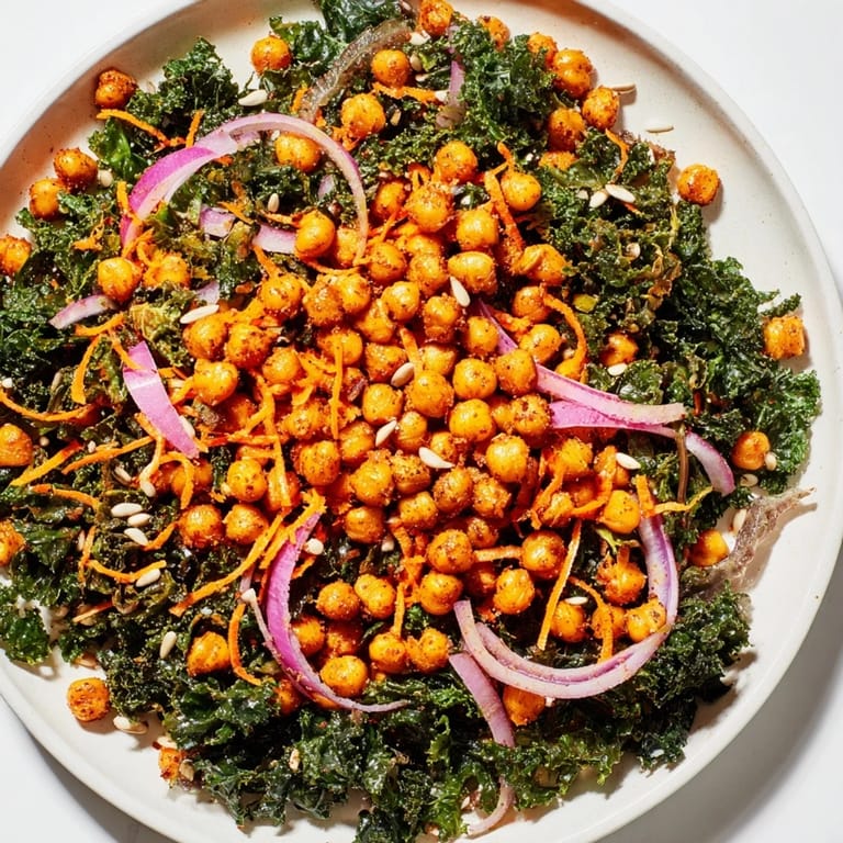Hearty and delicious, this image shows a healthy Kale Salad with Roasted Chickpeas ready to be enjoyed.