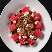 Fresh Watermelon and Feta Salad with Balsamic Glaze: A close-up view of the vibrant summer salad.